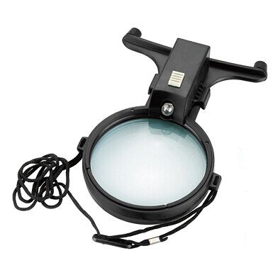 Chest mounted magnifier